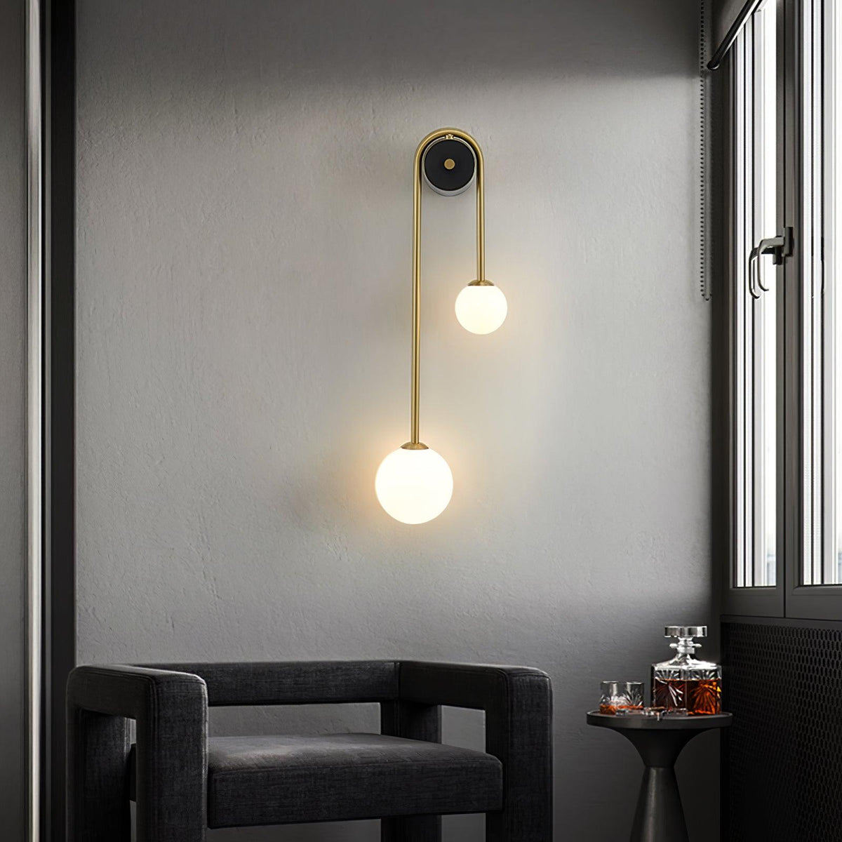 Curved Brass Two-Light Globe Wall Sconce